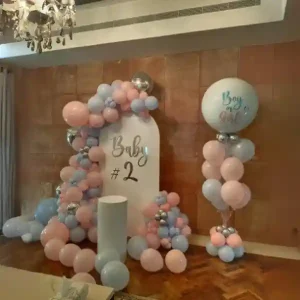 A charming baby shower balloon decoration featuring pastel-colored balloons arrangement of "Baby Shower" celebration.